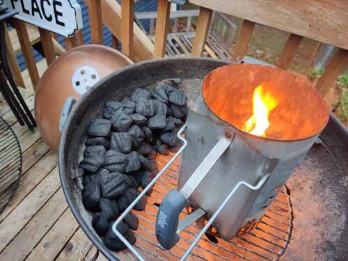 Kettle with chimney of coals starting